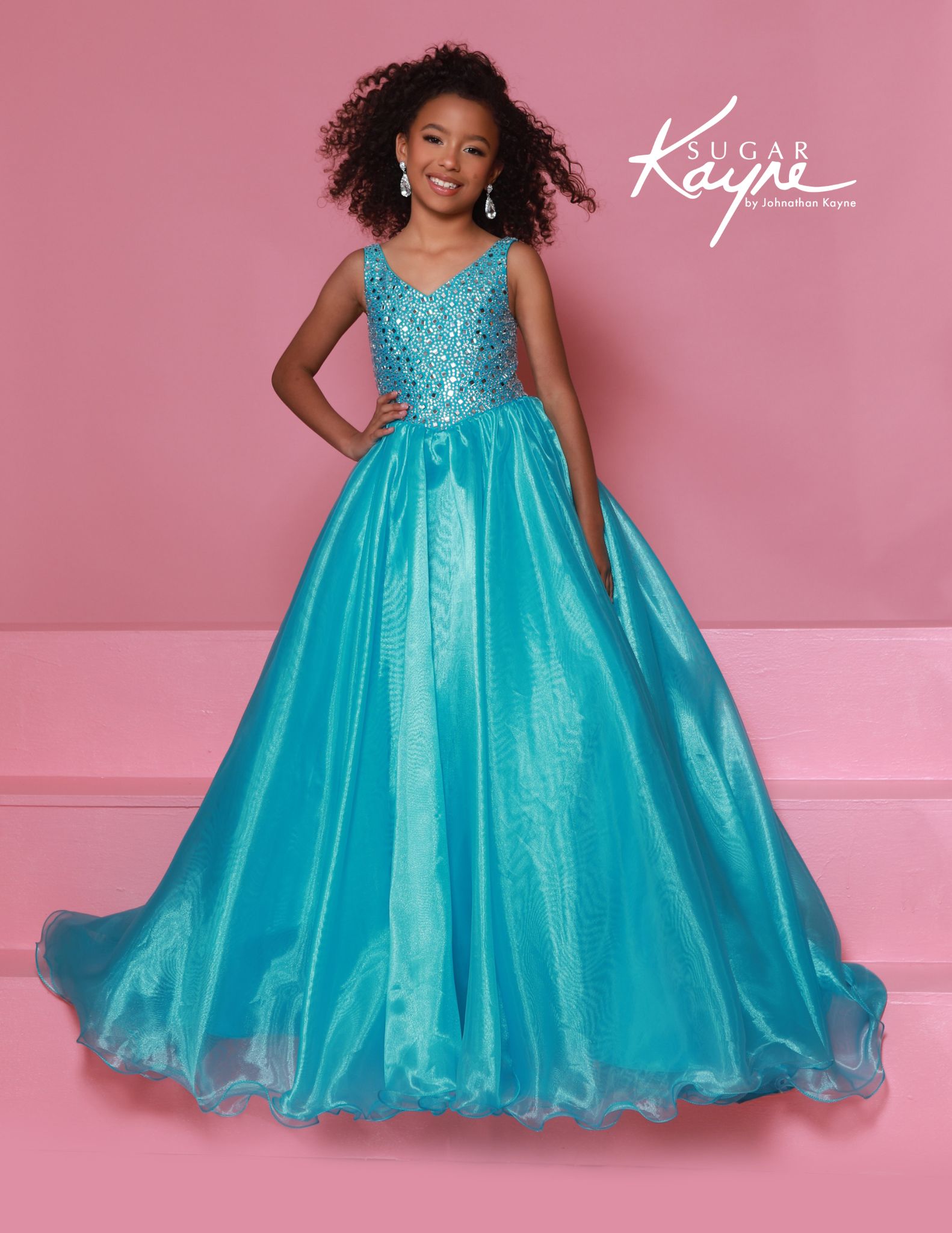 Aqua sparkle bodice ball gown for girls featuring a full organza skirt and v-neckline, perfect for pageants or formal events.